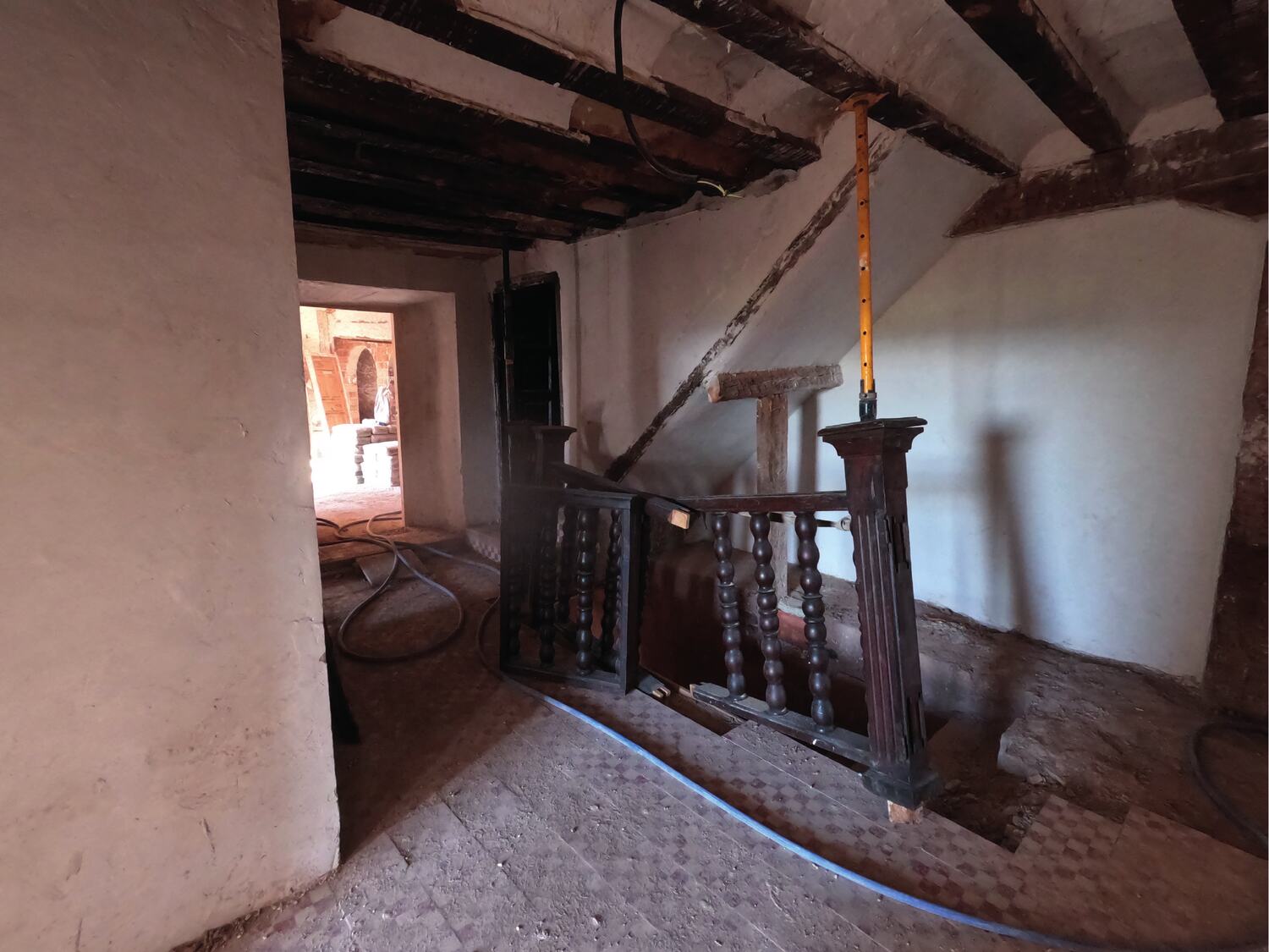 The stair with its turned balusters